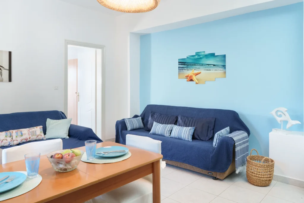 Family Suite: Living room with sofa-bed