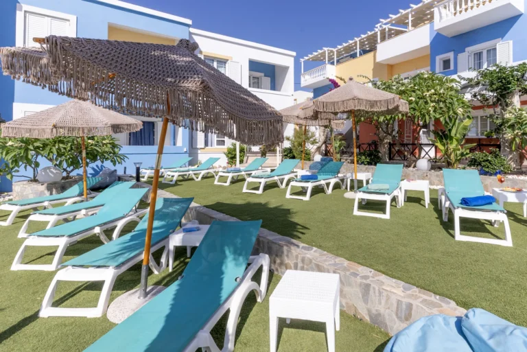 Sun loungers and parasols at Saraya Resort